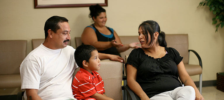 family in lobby